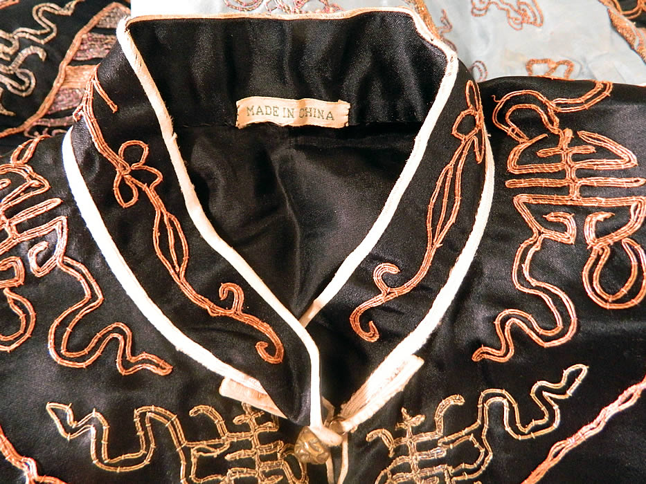 Vintage Chinese Couching Embroidered Ji Luck Phoenix Dragon Robe Jacket. It is fully lined and there is an old "Made in China" label sewn inside. 