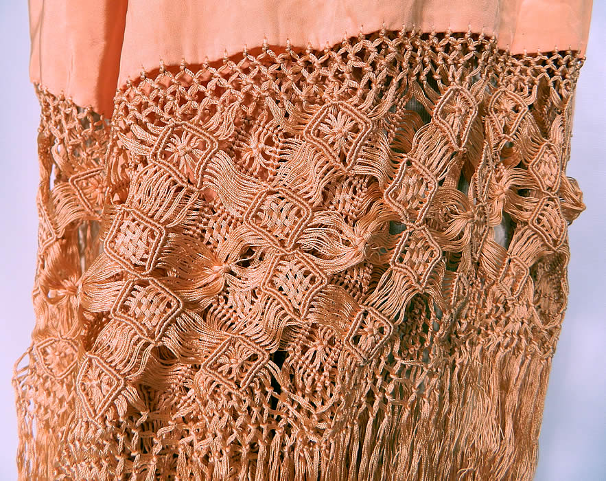 Antique Art Deco Pastel Peach Silk Macrame Fringe Flapper Piano Shawl. The shawls fabric square measures 46 by 46 inches. It is in good wearable condition. This beautiful bohemian Art Deco flapper Spanish Flamenco style shawl is truly a wonderful piece of wearable textile art! 