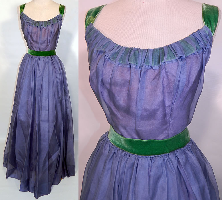 Vintage Blue Organdy Pink Taffeta Green Velvet Trim Formal Gown Dress. This vintage blue organdy, pink taffeta, green velvet trim  formal gown dress dates from the 1950s. It is made of an iridescent pink silk taffeta fabric lining, with a blue gray sheer organdy overlay dress and emerald green velvet trim neckline, shoulder straps, sash belt.