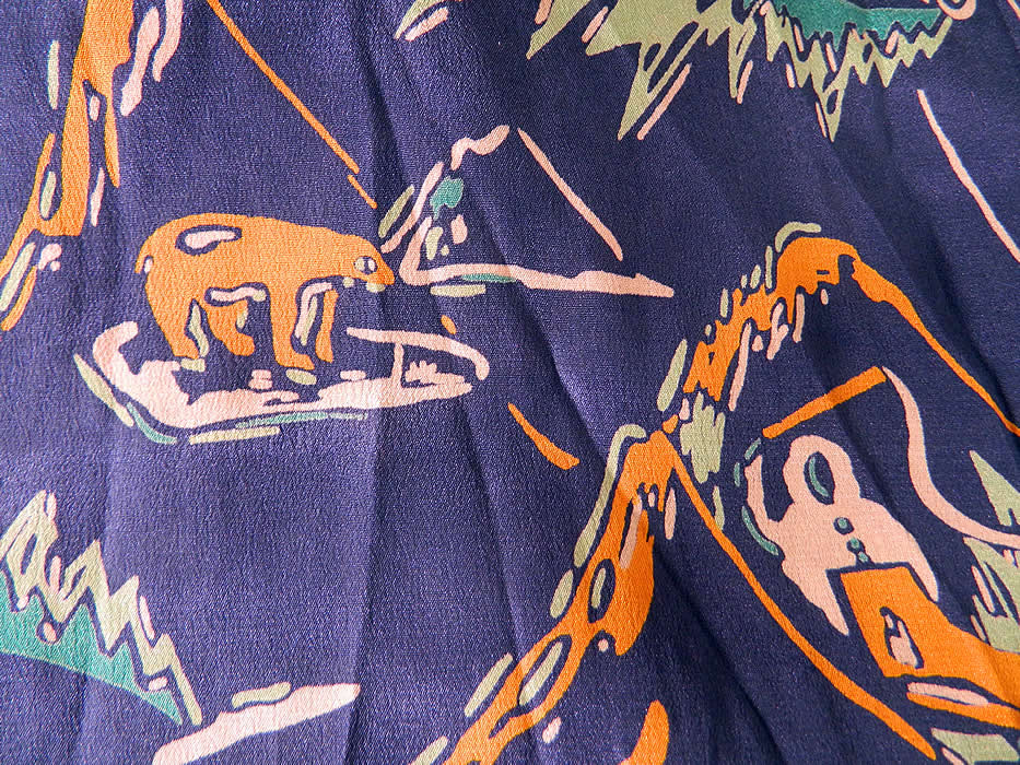 Vintage Alaskan Arctic  Eskimo Igloo Novelty Print Silk Drop Waist Dress. Bear and Eskimo. This is truly a rare and unique piece of wearable Art Deco textile art! 