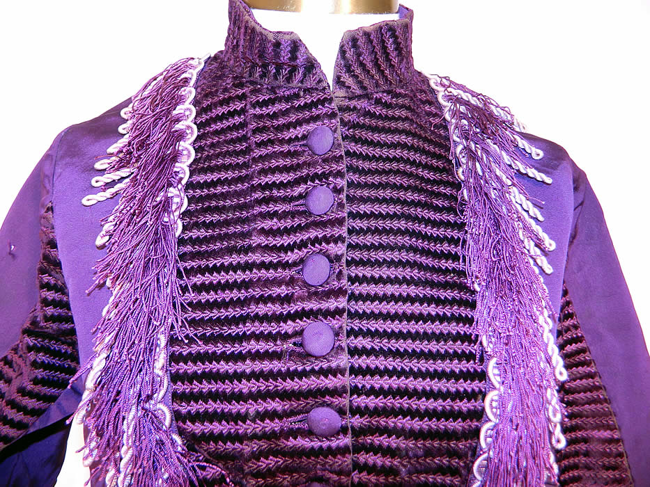 Victorian Purple Plum Silk Velvet Fringe Trim Belted Bodice Top. It is made of a purple plum color silk taffeta fabric, with a striped velvet fabric front accents and purple & white silk rope fringe trim. 