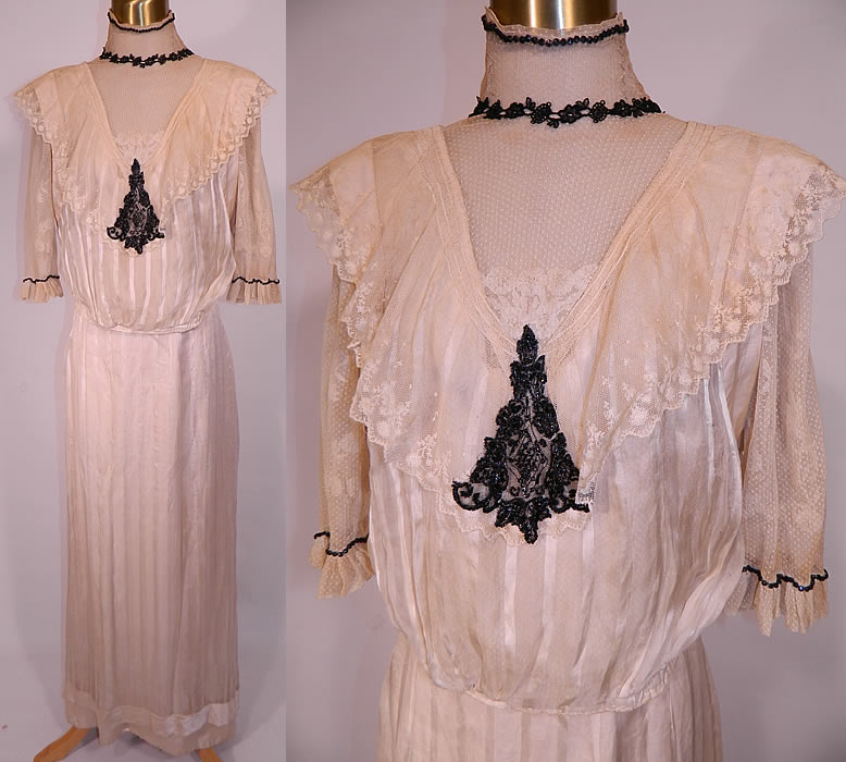 Edwardian Cream Silk Striped Net Lace Black Jet Beaded  Dress. This antique Edwardian era cream silk striped net lace black jet beaded dress dates from 1910. It is made of an off white cream color sheer silk striped fabric, with embroidered net lace and black jet beaded trim accents. 