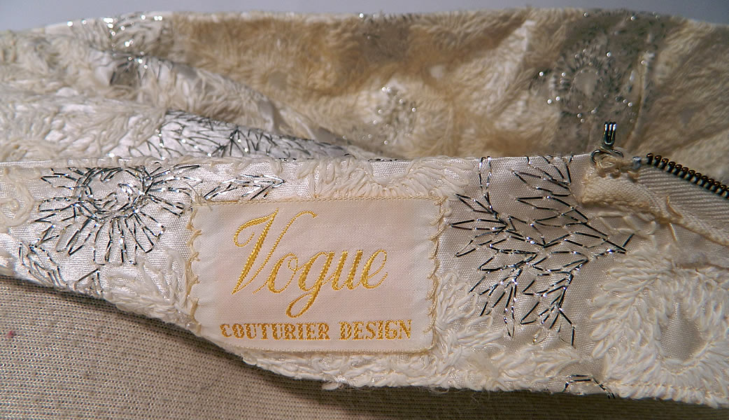 Vintage Vogue Couturier Design Silver Lame Brocade Sheath Dress Evening Gown Lamé. There is a "Vogue Couturier Design" label sewn inside. 