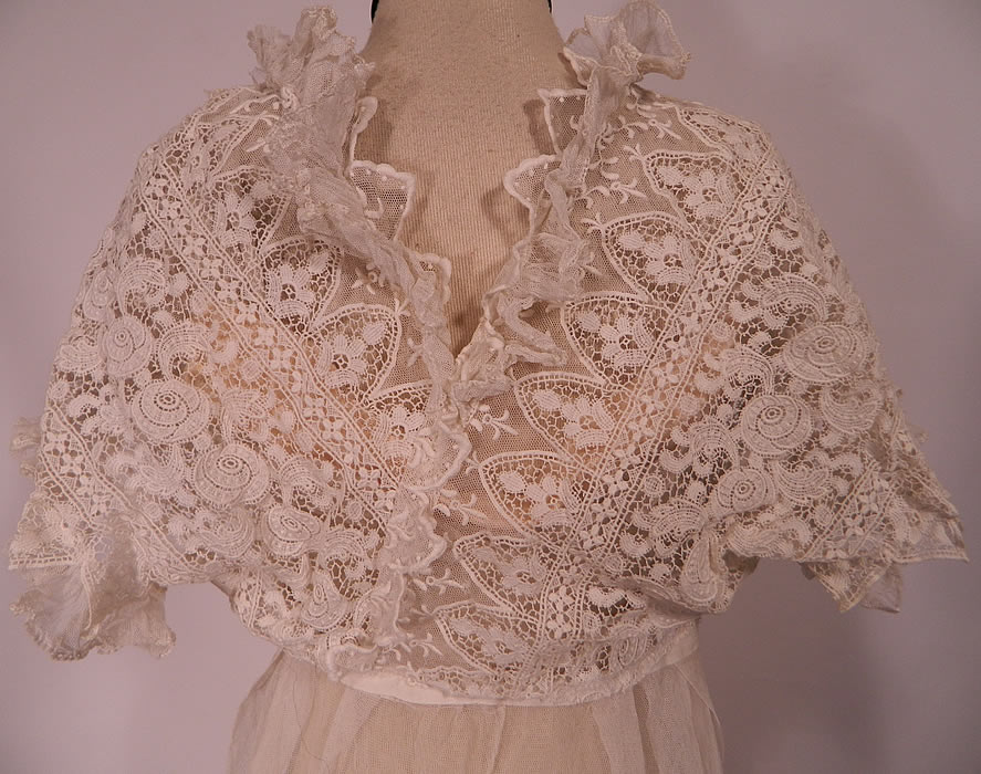 Edwardian Embroidered White Net  Lace Graduation Wedding Dress. The dress measures 55 inches long, with 34 inch hips, a 24 inch waist and 34 inch bust. It is in good condition. This is truly a wonderful piece of antique textile lace art which could be worn as a wedding gown or graduation dress!