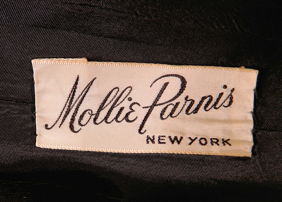 Vintage Mollie Parnis  Heart Novelty Print Silk Circle Skirt Peplum Suit Jacket Dress. There is a "Mollie Parnis New York" designer label sewn inside the skirt and a "Saks Fifth Avenue Debutante Shop" store label sewn inside both garments. It is in excellent condition. This is truly a wonderful piece of wearable art! 