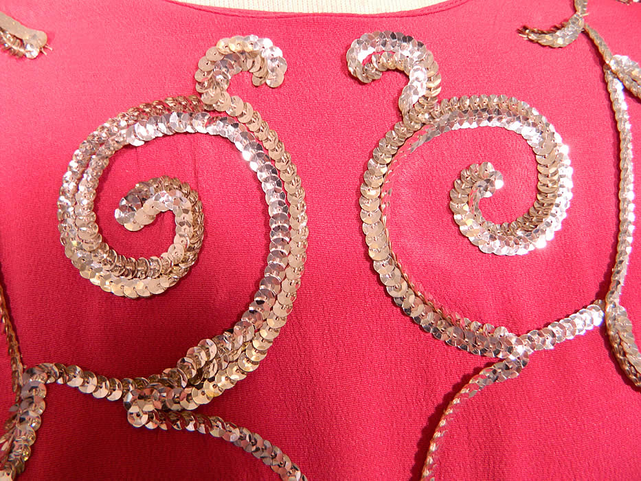 Vintage Burgundy Silk Crepe Silver Sequin Beaded Drape Skirt Evening Gown Dress. The dress is a large size measuring 60 inches long, with 38 inch hips, a 30 inch waist, 38 inch bust, 16 inch back and 16 inch long sleeves. It is in good condition, with only a small open seam on the sleeve which needs restitching. This is a wonderful piece of wearable art! 