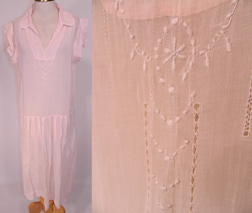 Vintage Pink Cotton White Embroidered Drawn Work Boho Peasant Drop Waist Dress. This vintage pink cotton white embroidered drawn work boho peasant drop waist dress dates from the 1920s. It is made of a pale pastel pink sheer cotton muslin fabric, with drawn cut work and white raised padded satin stitch hand embroidery work on the front top.