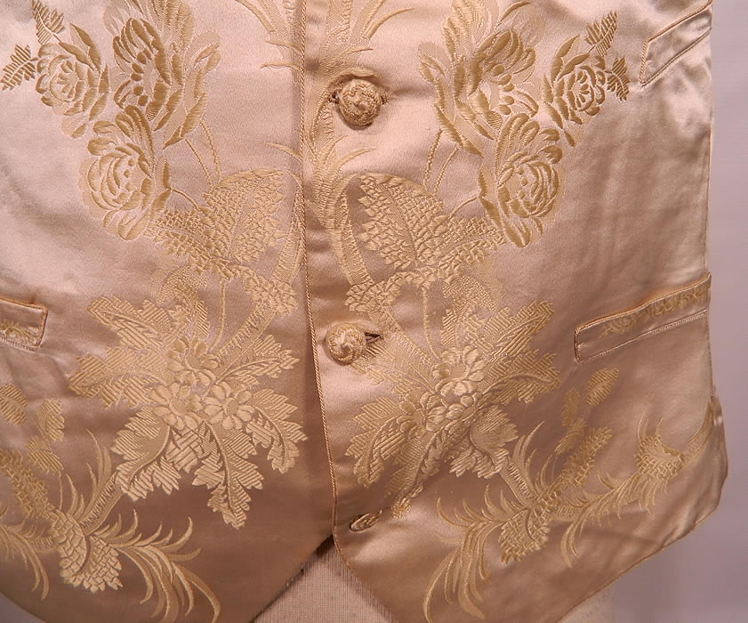 Victorian Gentlemen's White Silk Damask Floral Brocade Wedding Waistcoat Vest. It is hand stitched and made of an off white ivory color silk damask botanical floral embossed brocade fabric. 