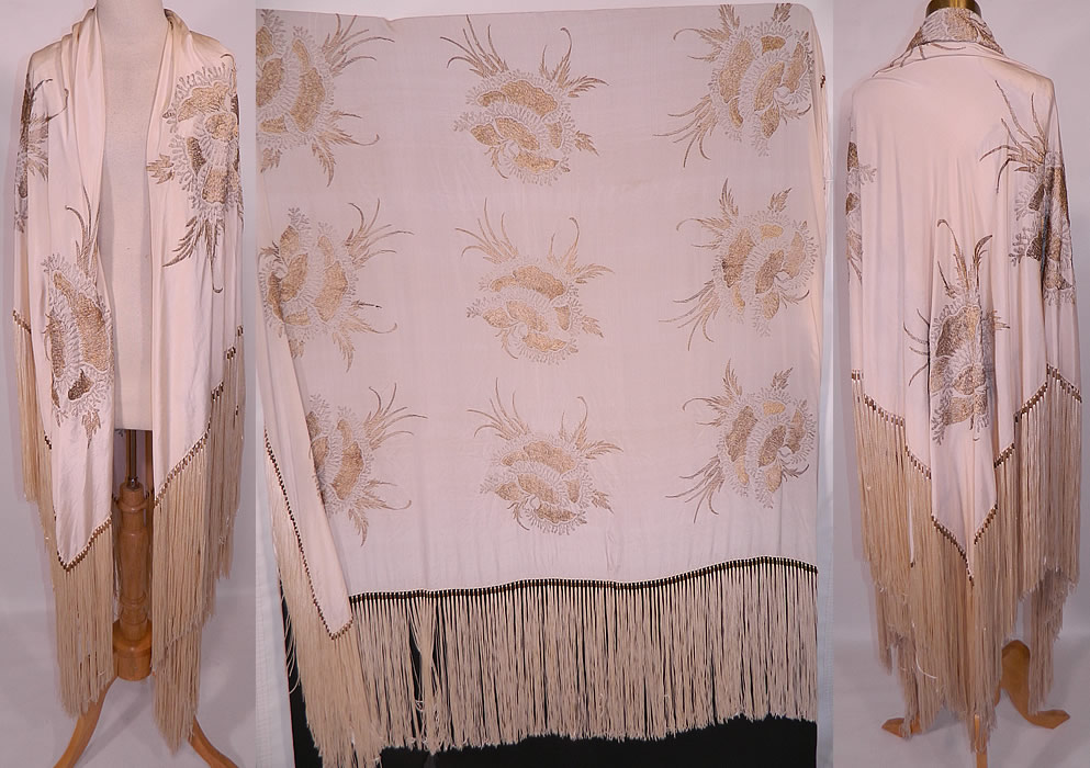 Vintage Silver & Gold Lame Lamé Cream Silk Fringe Flapper Piano Shawl. This vintage antique silver and gold lamé cream silk fringe flapper piano shawl dates from the 1920s. It is made of an off white cream color silk fabric, with silver and gold metallic lamé threads woven into the fabric creating a floral damask brocade pattern.