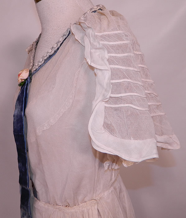 Vintage Crinoline Maid Edwardian White Net Lace Ruffle Shawl Collar Dress. The dress measures 51 inches long, with 34 inch hips, a 25 inch waist and 34 inch bust.