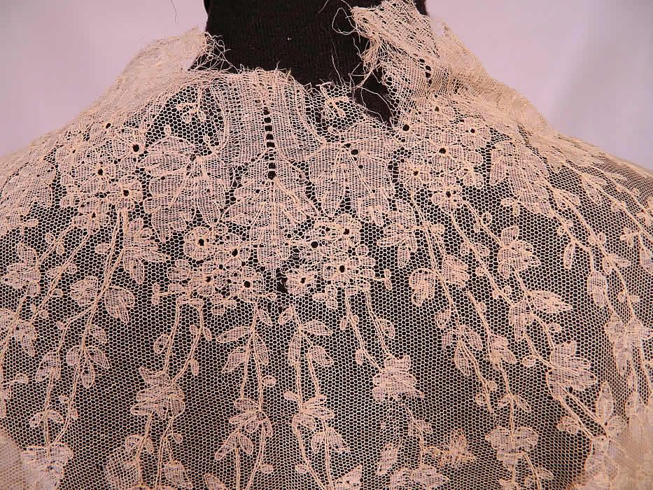 Victorian Civil War Antique Blonde Chantilly Lace Mantilla Shawl Cloak Cape. The shawl measures 43 inches long, 83 inches wide and has a 20 inch neck. It is in as-is fragile condition, with a frayed back neck and several small holes scattered (see close-ups). This is truly a rare and wonderful piece of antique Victoriana lace art! 