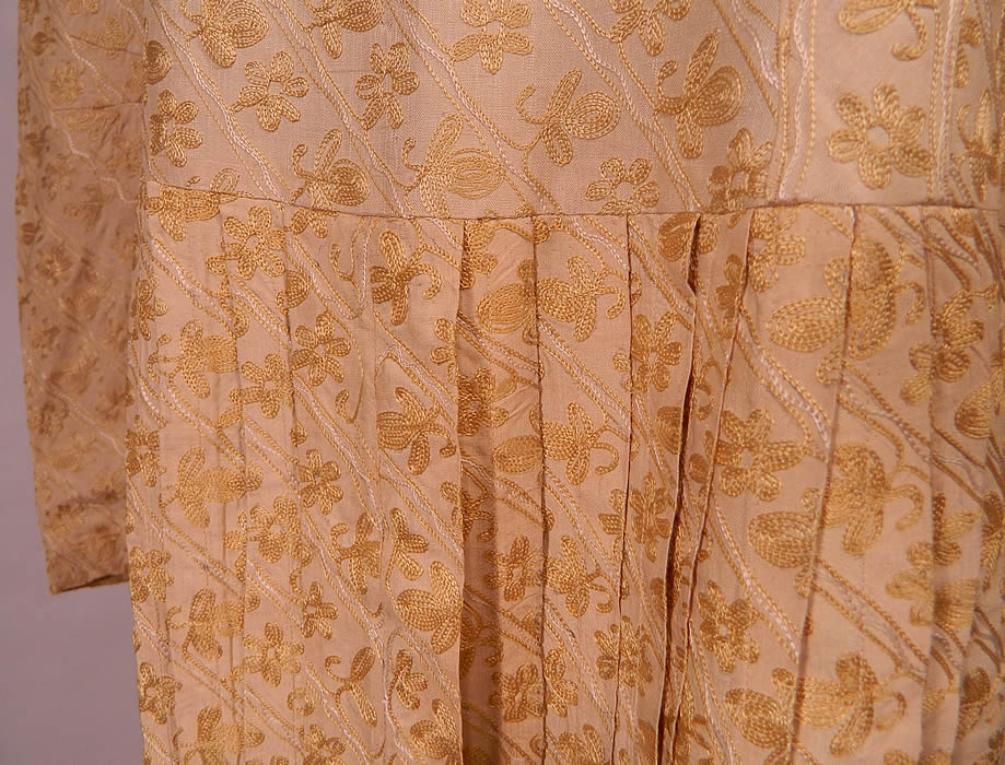 Vintage  Cream Silk Chain Stitch Embroidered Ethnic India Boho Dress. The dress measures 43 inches long, with 38 inch hips, a 32 inch waist, 36 inch bust and 22 inch long sleeves. It is in good condition. 