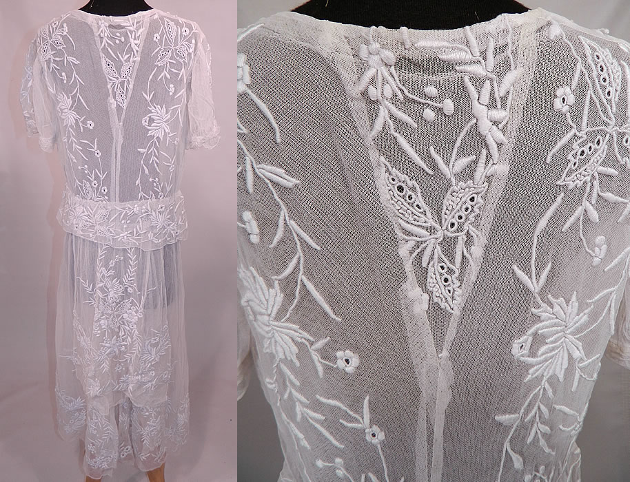 Vintage White Net Embroidered French Knot Lace Peplum Drop Waist Dress. It is in excellent clean condition. This is truly an exquisite piece of wearable lace art!