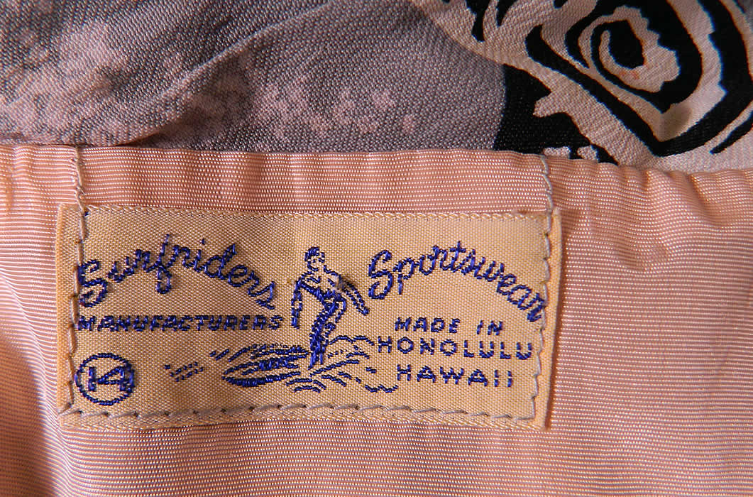 Vintage Surfriders Sportswear Hawaiian Hibiscus Print Rayon Strapless Sarong Dress. The dress measures 35 inches long, with 34 inch hips, a 24 inch waist and 34 inch bust. It is in good condition. This is truly a wonderful piece of collectable Hawaiiana vintage textile art! 