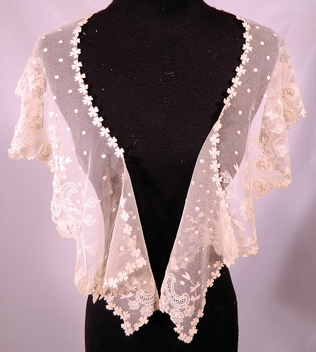 Antique Shamrock Limerick Lace Tambour Embroidery Trim  Shawl Collar. It is made of a needle-run tambour embroidery on a sheer fine off white blonde cream color net foundation, with a floral vine leaf, polka dot pattern design and shamrock four leaf clover edging. 