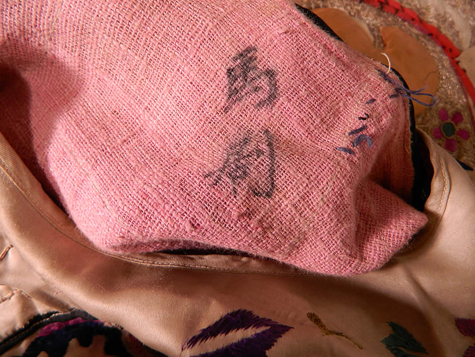 Antique Chinese Dragon Silk Embroidered Peking Opera Warrior Robe
It is fully lined in a pink linen fabric with Chinese characters written inside (see close-up). 