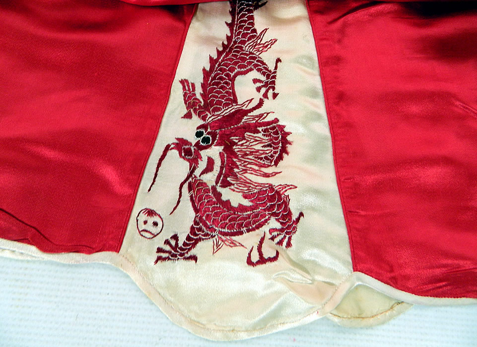 Vintage Red & White Silk Embroidered Asian Chinese Dragon Pajamas. 
It is in good condition. This is truly a wonderful piece of wearable Asian textile art! 