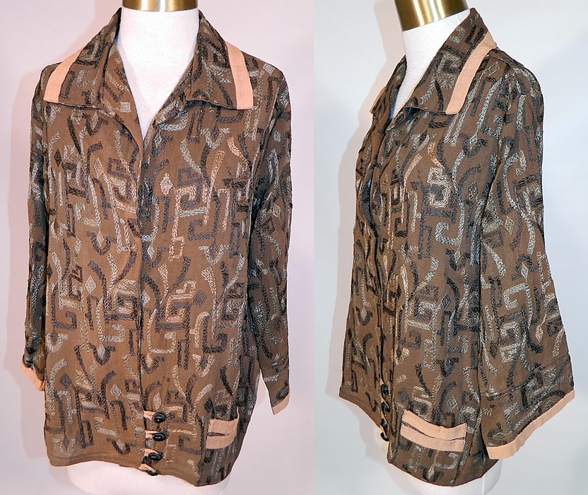 Vintage Art Deco Brown Silk Crepe Embroidered Flapper Blouse Coat Jacket
This vintage Art Deco brown silk crepe embroidered flapper blouse coat jacket dates from the 1920s. It is made of a brown silk crepe de chine fabric, with varying shades of brown & taupe silk stitching embroidery work done in Art Deco abstract geometric ethnic designs.