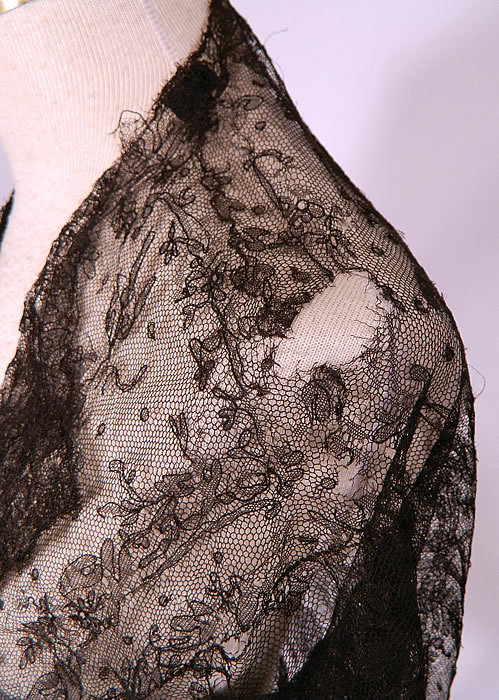 Victorian Civil War Antique Black Chantilly Lace Shawl Jacket Pagoda Sleeve
It is in as-is fair fragile condition, with several small frayed holes along the shoulders, on the back sleeve seam and bottom front (see close-ups). This is still a wonderful piece of antique Victoriana lace art! 