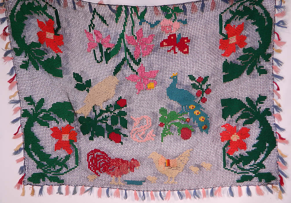 Vintage Colorful Ribbonwork Woven Crochet Fringe Floral Peacock Bird Boho Shawl
This vintage colorful ribbonwork woven crochet fringe floral peacock bird boho shawl dates from the 1920s.