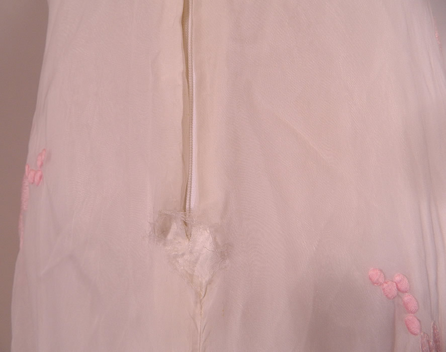 Vintage White Organdy Pink Embroidered Flower Formal Gown Skirt Train Dress
It is in good condition, with only a small frayed hole on the bottom back zipper seam (see close-up). This is truly a wonderful piece of wearable art!