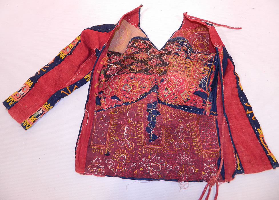 Vintage Antique Indian Gujarati Kutch Work Embroidered Mirror Choli Boho Blouse Top
This is truly a wonderful piece of Indian Pakistani folk culture colorful boho wearable art!