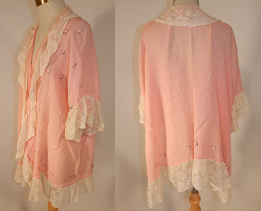 Vintage Pink Cotton Embroidered Daisies Lace Trim Flapper Peignoir Robe Bed Jacket
The robe measures 32 inches long, with a 45 inch waist and 45 inch bust. It is in good condition, with a faint stain on the back. This is truly a wonderful piece of flapper wearable lingerie art! 