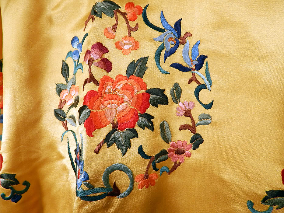 Vintage Bai hua Chinese Yellow Silk Rayon Embroidered Peony Flower Robe Coat
The robe measures 27 inches long, with a 46 inch waist and 40 inch bust. It is in excellent condition. This is truly a wonderful piece of wearable antique Chinese art!