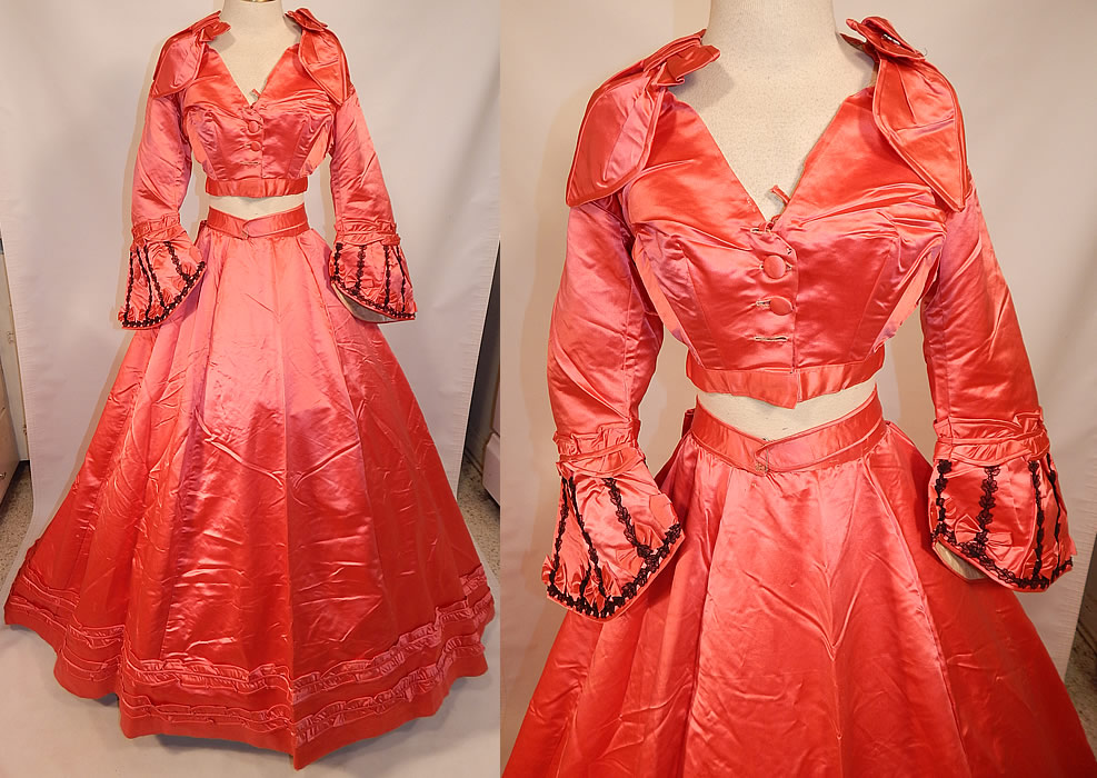 Victorian Magenta Pink Silk Ball Gown With Train Skirt 2 Bodices & Bow Belt
This antique Victorian era magenta pink silk ball gown with train, two bodices and bow belt dates from the late 1860s. 