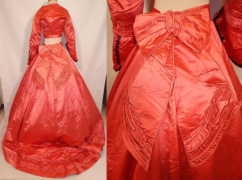 Victorian Magenta Pink Silk Ball Gown With Train Skirt 2 Bodices & Bow Belt
The first bodice has long sleeves, with flared bell shape cuff, black Chantilly lace trim, a V front neckline, button front closure and is fully lined. 