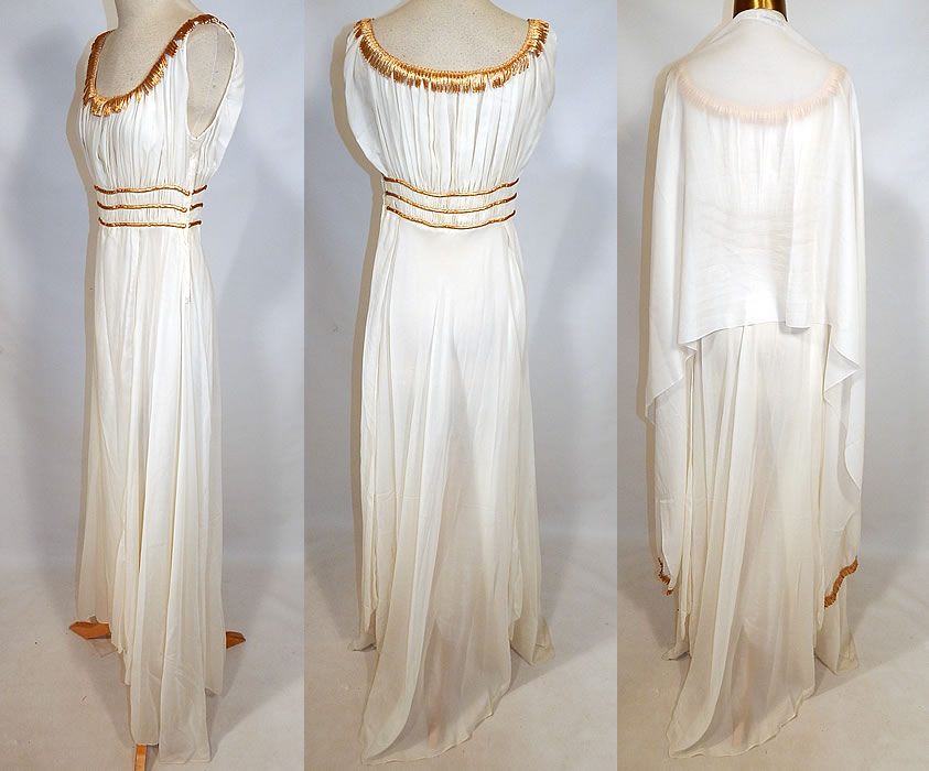 Vintage John Norman Lord & Taylor White Chiffon Grecian Goddess Gown
This gorgeous Grecian goddess gown is a long floor length, with a flowing wrap open slit skirt, slight back train, low rounded scoop necklines, a pleated sleeveless top, fitted waist, side zipper closure and is sheer, unlined. The dress measures 60 inches long, with a 24 inch waist and 34 inch bust. 