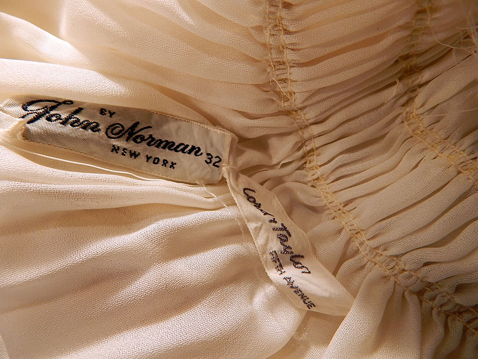 Vintage John Norman Lord & Taylor White Chiffon Grecian Goddess Gown
Both have a "By John Norman New York" lingerie designer label and "Lord & Taylor Fifth Avenue" store label, size 32 tag sewn inside. It is in excellent condition. This is truly a wonderful piece of high quality lingerie wearable art!