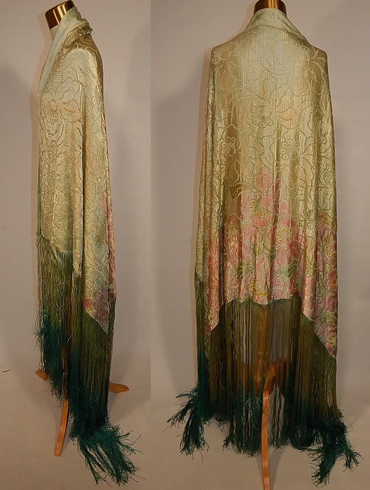 Vintage Pastel Green Silk Pink Floral Lace Ombre Fringe Flapper Shawl Cloak Cape
It is made of a pastel mint green color silk fabric lining, covered with a sheer mint green floral pattern lace with hand painted pink highlights and varying shades of green ombre silk fringe. 