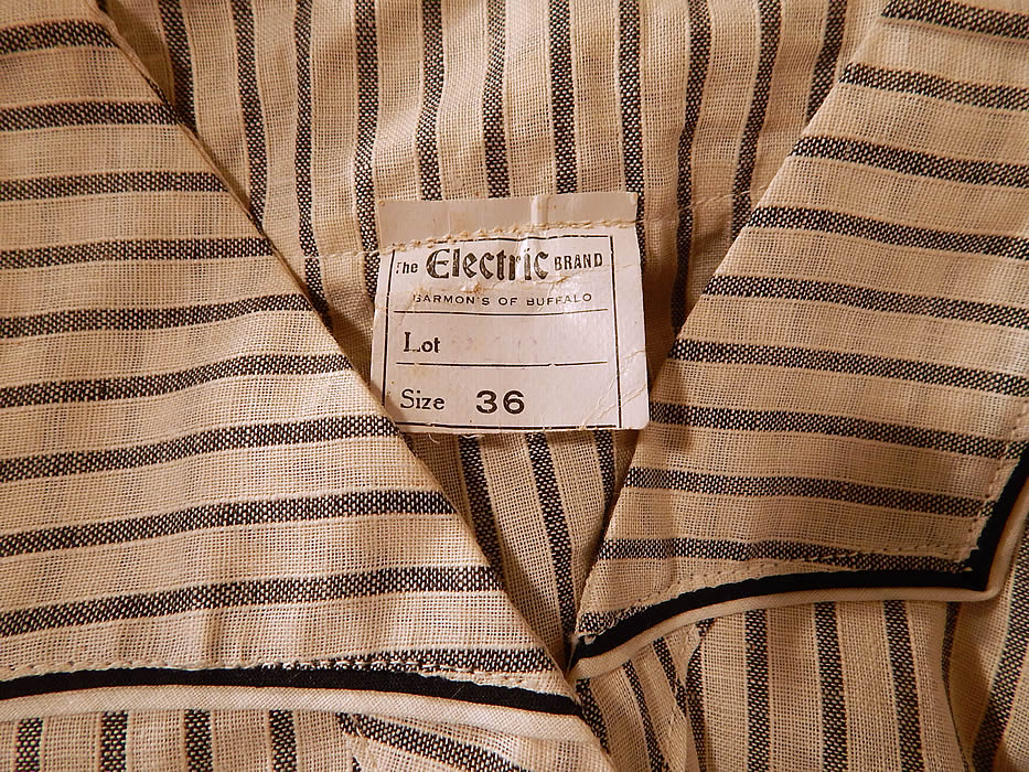 Edwardian Electric Brand Black & White Striped Cotton Workwear House Dress NWT
The dress measures 54 inches long, with a 26 inch waist and 36 inch bust. It is in excellent never worn condition, with all of the original tags still attached. This is truly a rare and wonderful piece of unworn antique textile art! 