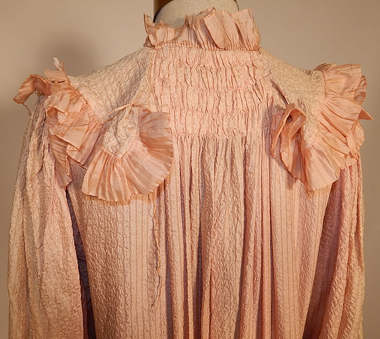 Victorian Pink Crinkle Crepe Silk Ruffle Morning Tea Gown Wrapper Robe Dress
It is in fair as-is condition, has not been cleaned, with fade discoloration and fraying of the silk ribbon trim in areas (see close-up). This is truly a wonderful piece of Victoriana wearable art!