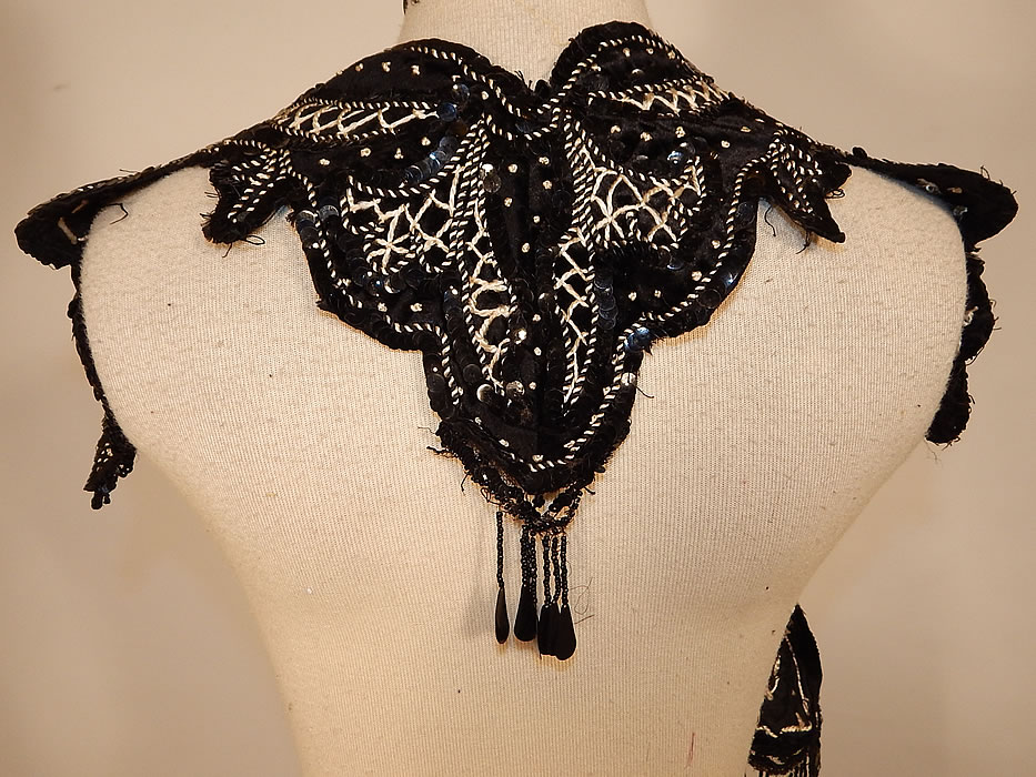 Edwardian Black Silk Velvet White Soutache Embroidery Dress Trim Collar
This sensational shawl collar dress trim has a scalloped edging and unusual shape. The collar measures 36 inches long and 8 inches wide. 