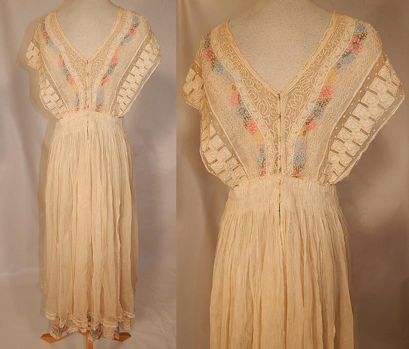 Edwardian Embroidered Pastel Flowers Cream Net Batiste Lace Dress Gown
The dress measures 49 inches long, with 44 inch hips, a 30 inch waist and 36 inch bust. 