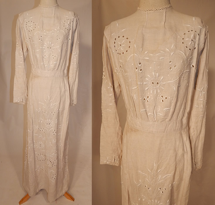 Edwardian Creamy Off White Linen Eyelet Embroidered Cutwork Garden Party Dress
This antique Edwardian era creamy off white linen eyelet embroidered cutwork garden party dress dates from 1905. It is made of a creamy off white ecru color fine quality linen fabric, with white raised padded satin stitch embroidery work and eyelet drawn cutwork done in a floral leaf design.