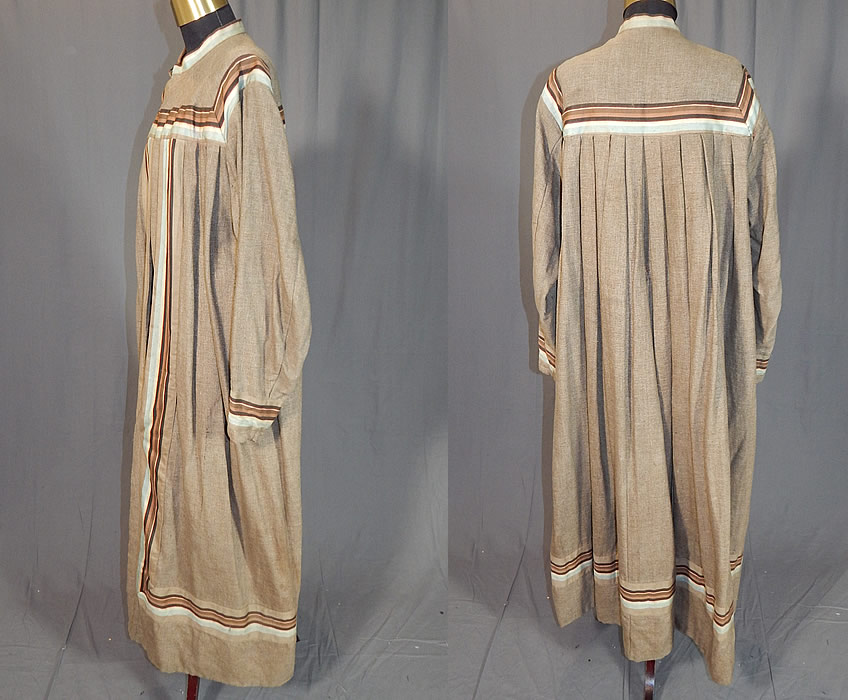 Victorian Taupe Tweed Wool Striped Ribbon Trim Wrapper Morning Dress Robe
This womens winter workwear wrapper morning dress robe is a long floor length, with a pleated back, high band collar, long full sleeves with fitted cuffs, an open front with two hook closures on the top and is fully lined in a heavy cotton twill fabric inside. 
