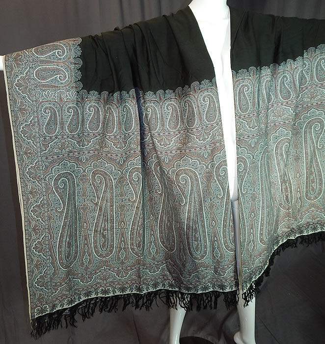 Victorian Antique Large Banquet Size Jacquard Loom Black & Blue Wool Paisley Shawl
These paisley shawls were made in Kashmir, Persia, India, Russia, USA and Europe in Scotland at Paisley itself. 