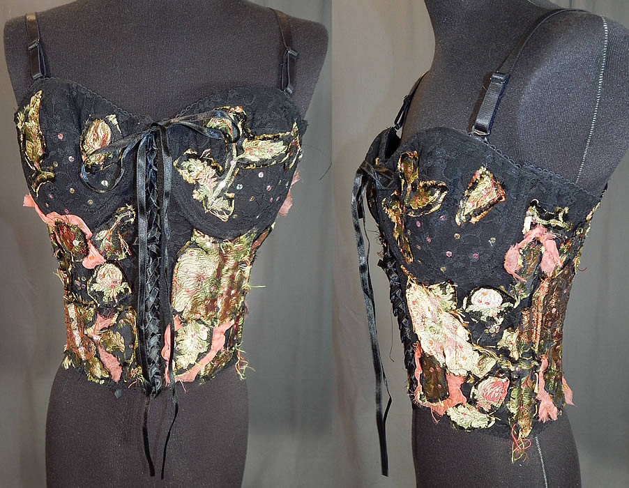 Vintage Alberto Makali Black Lace Silk Applique Trim Bustier Corset Top NWT
This vintage Alberto Makali black lace silk appliqué trim bustier corset top NWT dates from 1990. It is made of a black nylon lace fabric, with pastel pink and green silk damask floral print appliqué trim intentionally frayed and pieced together in a patchwork design and iridescent sequin accents.