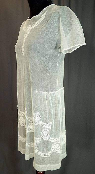 Vintage Girls White Sheer Tulle Net Soutache Ribbon Embroidery Drop Waist Dress
The dress measures 30 inches long, with a 30 inch waist and 30 inch bust. It is in good condition, with only a tiny pin hole on the skirt.