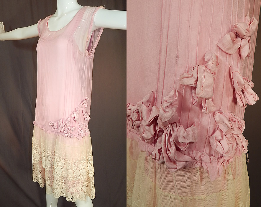 Vintage Pleated Pink Silk Rosette Flowers Cream Lace Ruffle Skirt Drop Waist Dress
This pretty pink lace loose fitting drop waist dress has a short tiered layered lace ruffle skirt, sleeveless with ruffle edged armholes and has an attached pink silk slip lining sewn inside. 