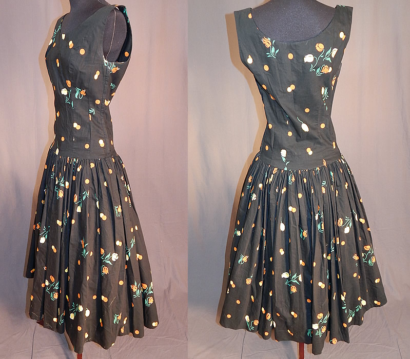 Vintage Black Cotton Polka Dot Tulip Novelty Print Fit & Flare Circle Skirt Dress
This retro summer sun dress has a fit and flare style, with a full circle skirt, fitted drop waist, sleeveless, rounded necklines, side zipper closure and is unlined.