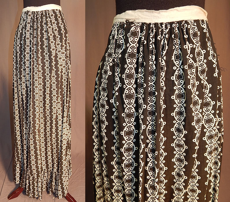 Victorian Black & White Cotton Calico Chain Link Print Workwear Pocket Skirt
This antique Victorian era black and white cotton calico chain link print workwear pocket skirt dates from 1900. It is made of a black and white cotton calico fabric, with an abstract geometric chain link pattern print design.