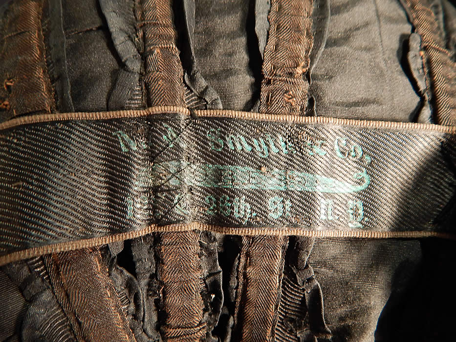 Victorian M.A. Smyth & Co Black Silk Lace Mutton Sleeve Mourning Bodice Jacket
There is an "M.A. Smyth & Co, New York" label sewn inside the waistband. 