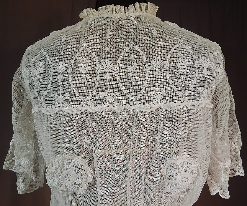 Titanic Edwardian Embroidered White Tulle Net Lace Applique Dress Tea Gown
The dress measures 47 inches long, with a 24 inch waist and 34 inch bust.