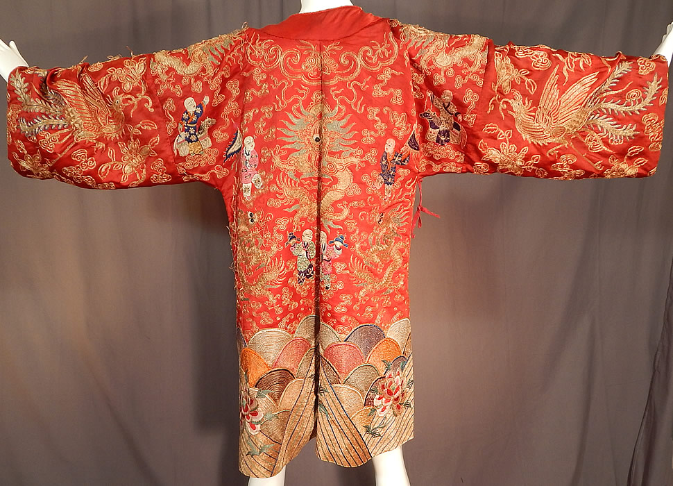 Antique Chinese Dragon Phoenix Gold Couching Embroidery Red Silk Opera Robe
There are Chinese figural people colorfully embroidered on both the front and back carrying various objects, fish and riding ponies.