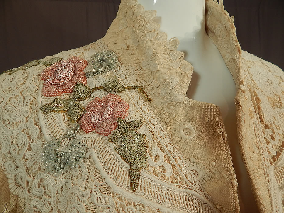 Vintage Antique Patchwork Cream Lace Floral Beaded Applique Trim Suit Jacket
There is a pink and green raised beaded appliqué floral roses trim sewn onto the shoulder.