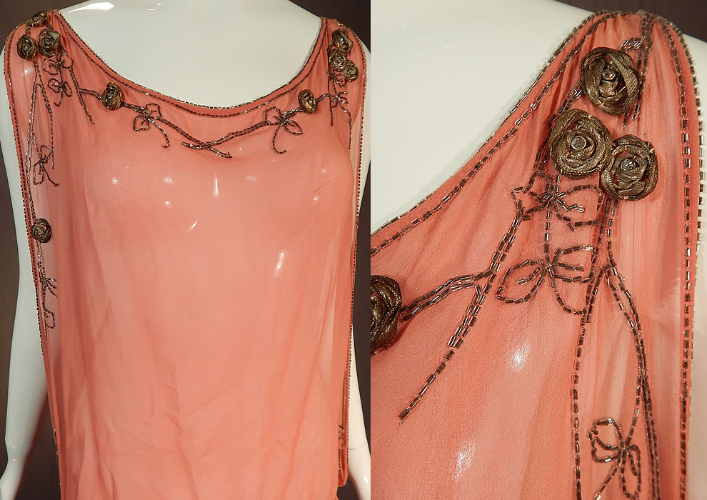 Vintage Art Deco Pink Silk Chiffon Gold Lamé Rosette Beaded Drop Waist Flapper Dress
This fabulous flapper dress has a loose fitting drop waist, tabard style with smocking along the sides of the waist, sleeveless with wide open arm holes, a side hook closure with bow trim and is sheer, unlined. 